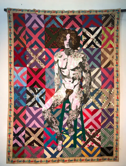 <p>Tiempo fuera. 2021. Aplicaciones de tela y bordado sobre colcha de parches. 210 x 170 cm.</p>
